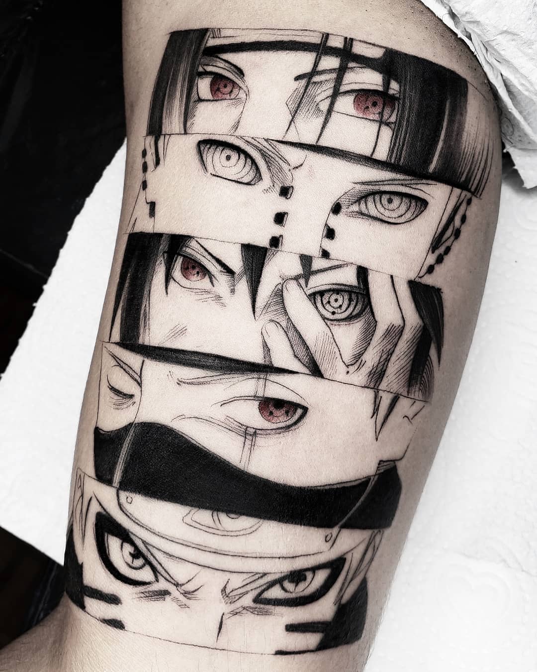black and grey anime tattoo